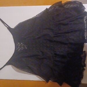 Small imaginary voyage black ruffle flair tank top